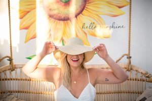 woman with hat enjoying a break