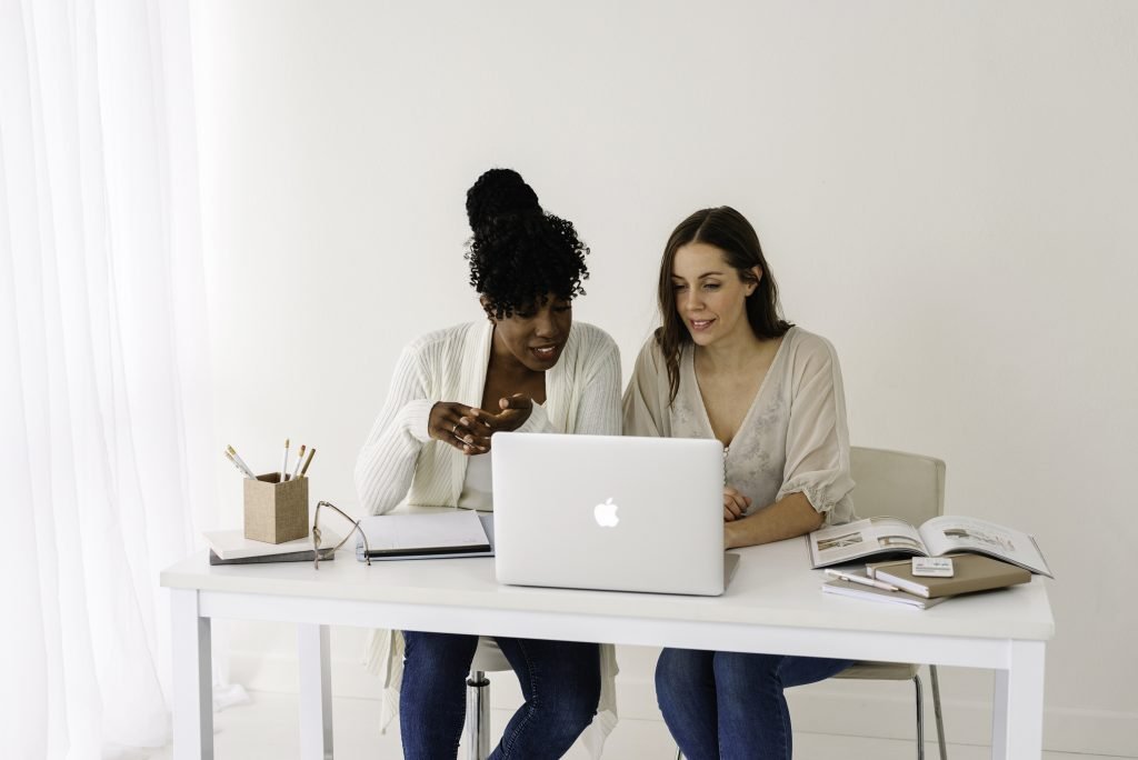 stock image of friends collaborating